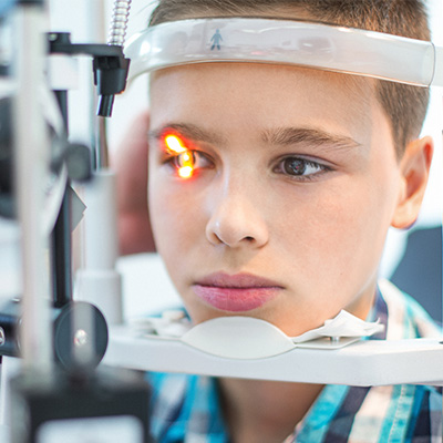 young boy eye exam